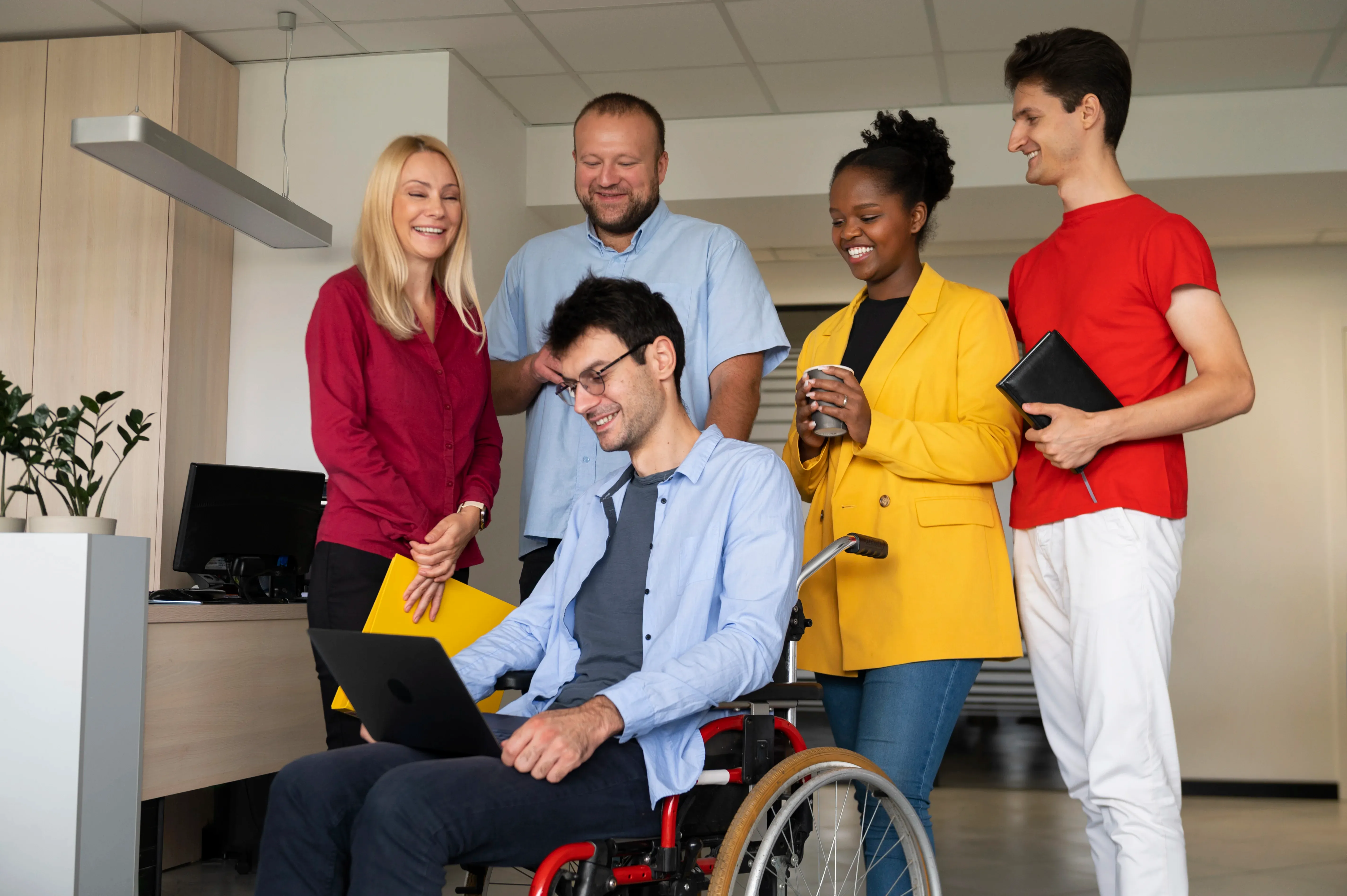 Support professionals working together in an office setting