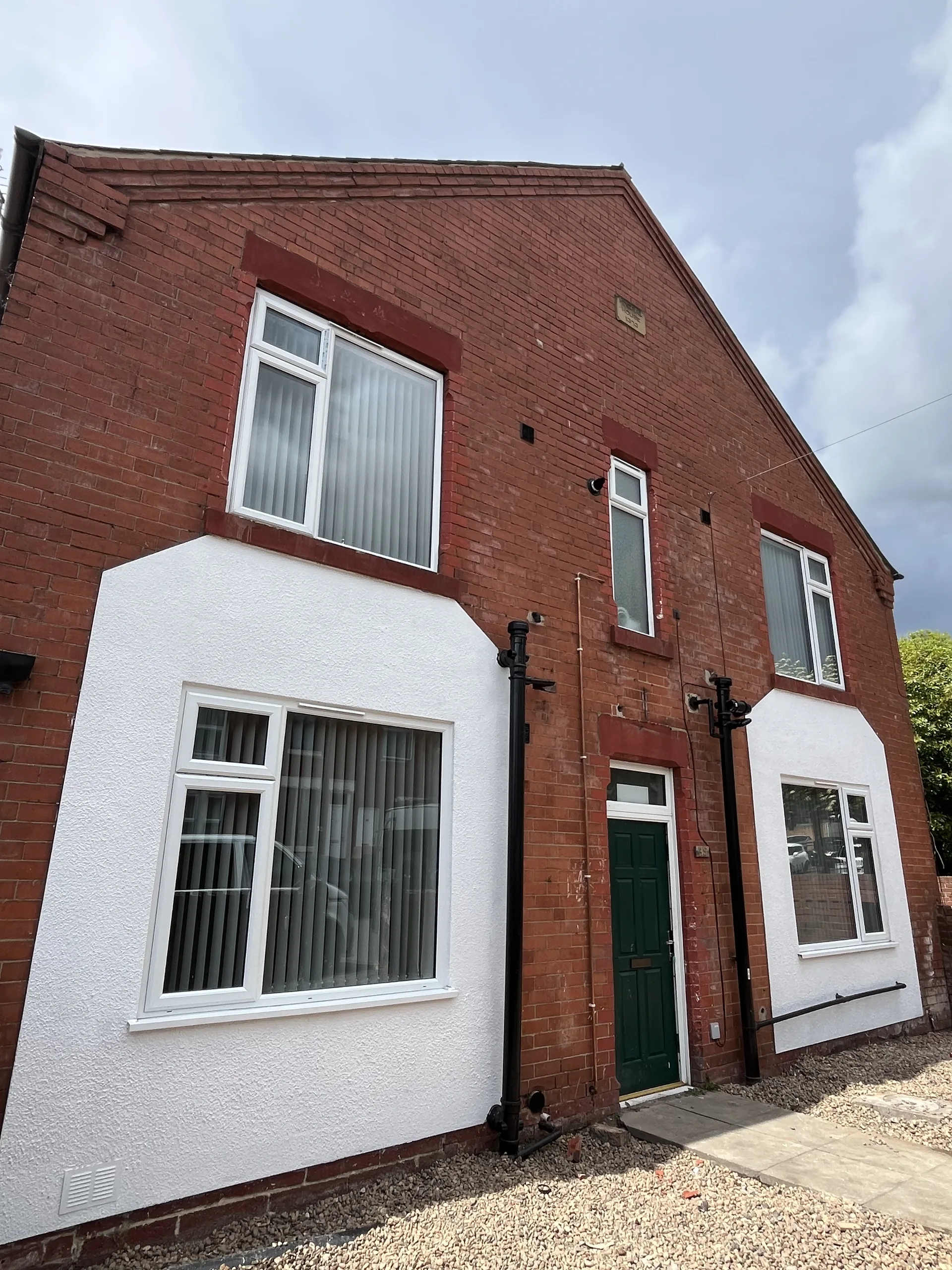 Red brick exterior of a Concept Support supported living home
